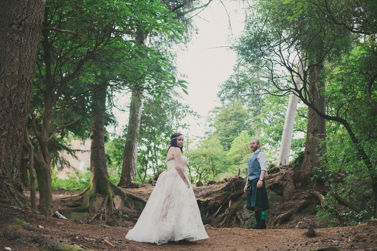 Bride and groom in Brodick Castle gardens on The Isle of Arran Scotland during elopement wedding