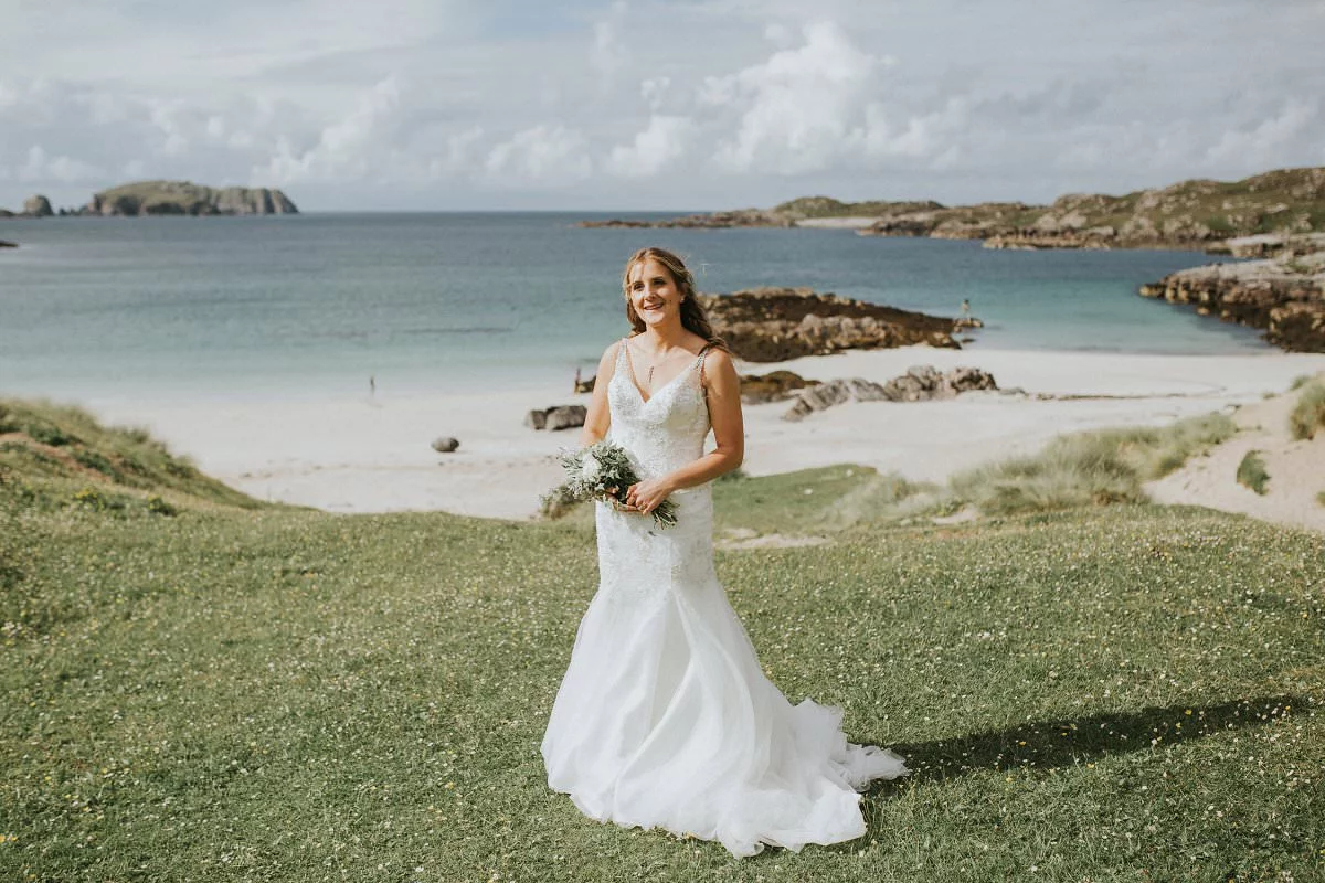 cliff edge beach wedding bride
